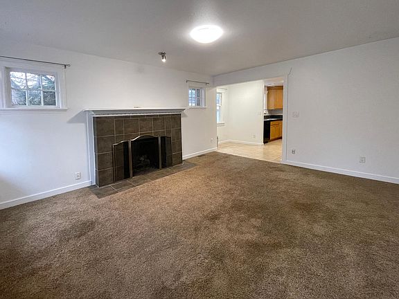 living room leading into kitchen and breakfast nook