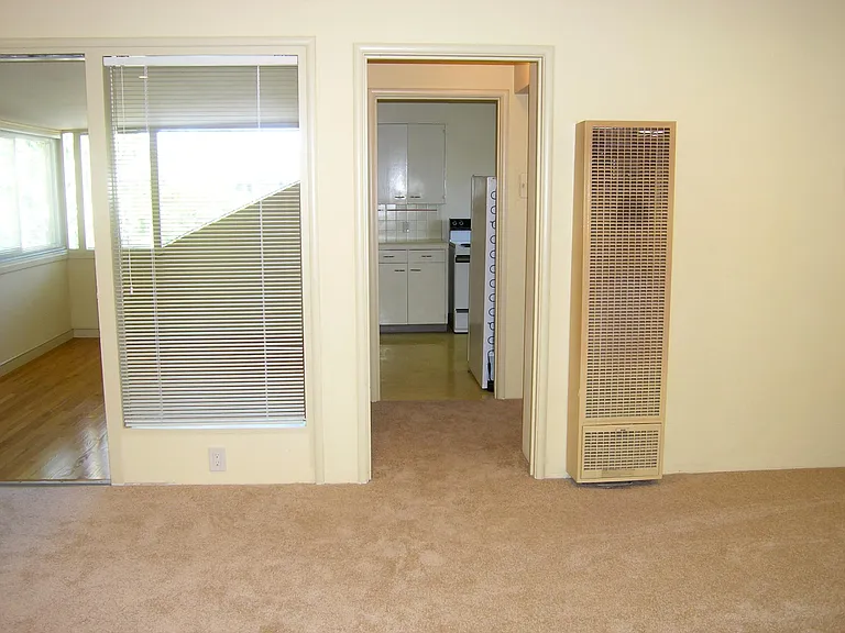 Bedroom is to the left and hallway to bathroom and kitchen