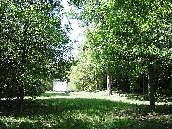 Storage building at the end of  yard