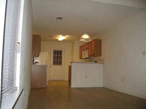 Large Galley Kitchen and Dining Area
