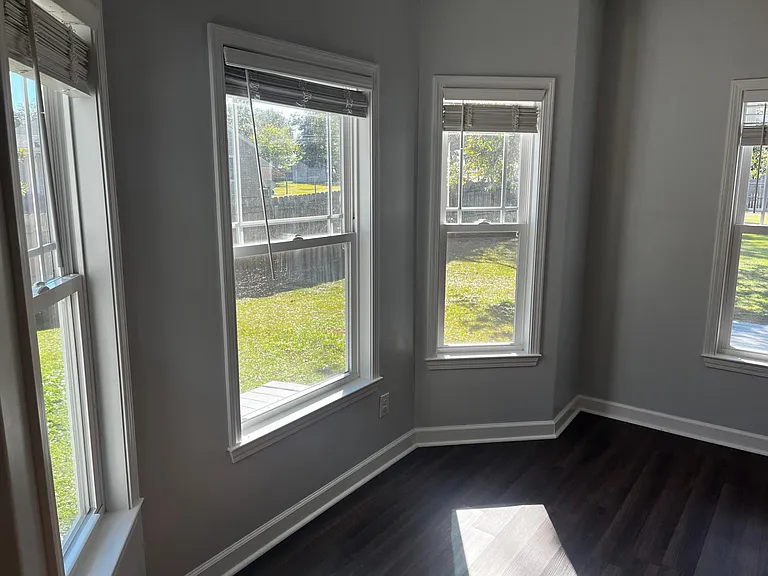 Sun-filled bay window area overlooking the back and side yard.