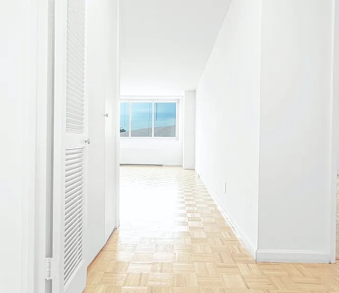 Step into a bright, spacious hallway at The Century, where natural light fills the area, creating an inviting atmosphere. Modern design meets comfort in every corner. Explore your new home today!