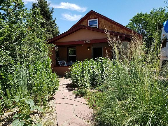 Front xeriscaped, butterfly friendly yard