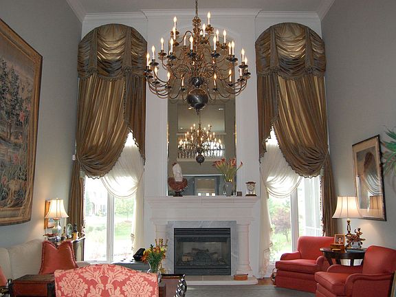 Great Room w/floor to ceiling windows and stone fireplace