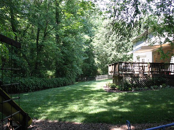 Large deck with remote controlled retractable awning for shade or sun