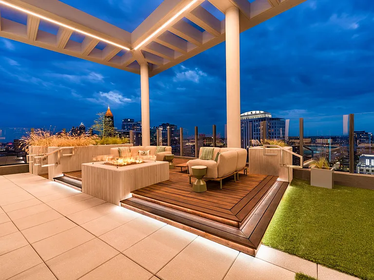 An elevated rooftop retreat at Modera Parkside in Atlanta pairs skyline views, inviting gathering space, and Midtown energy just beyond the terrace.
