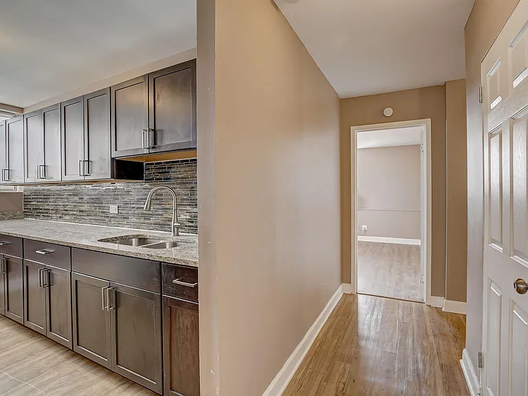 Almost every kitchen in the building is unique... but all have granite countertops and stainless steel appliances
