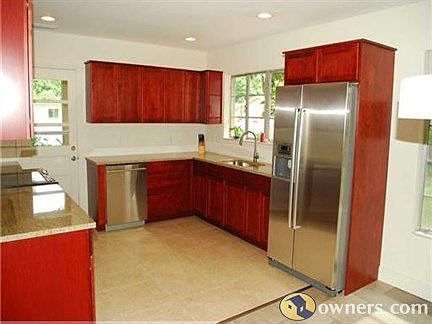Kitchen overlooks back yard