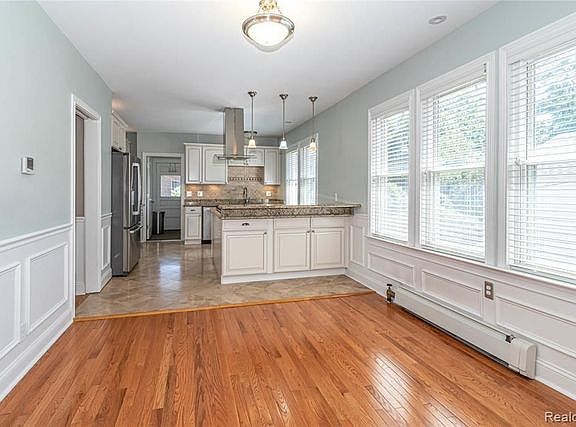 Large dining room area off kitchen.