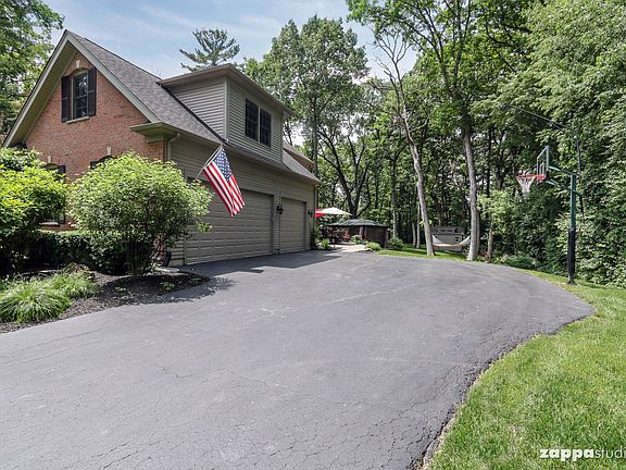 Huge, 3 car side load garage.