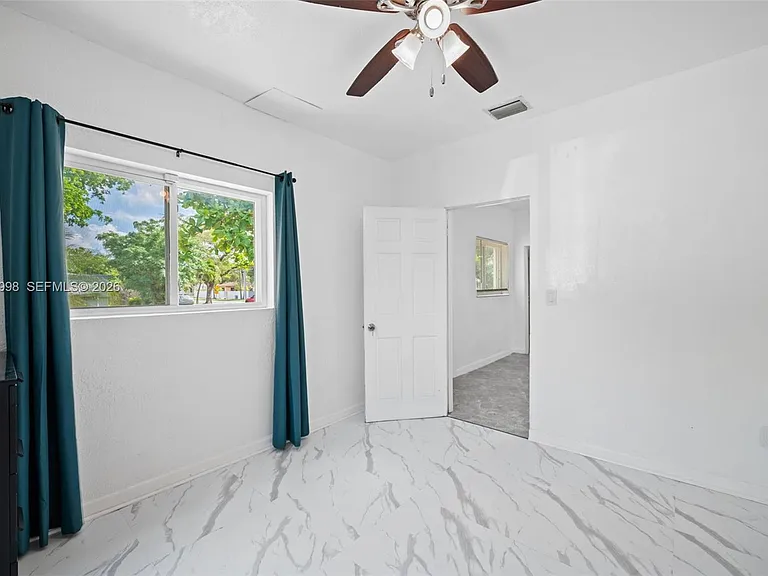1199 NW 121st St — Photo 11