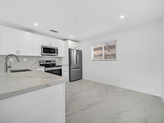 5th image of 532 NW 43rd Ct
