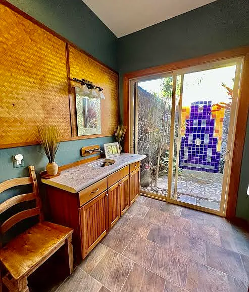 Guest bathroom with outdoor shower.