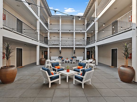 Relax and connect in our inviting courtyard lounge.