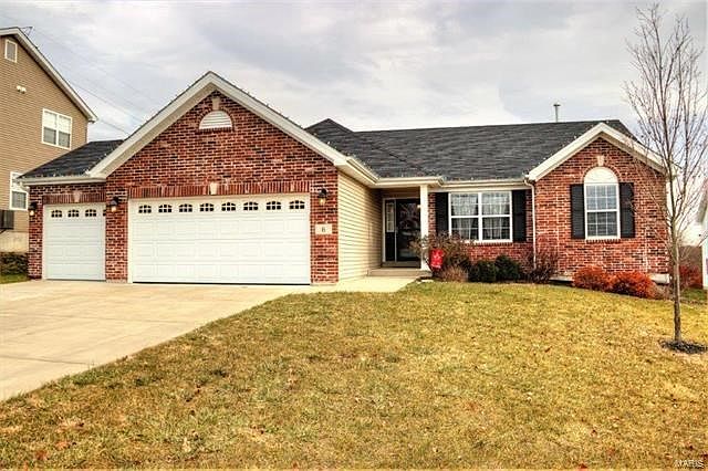 lots of curb appeal with brick upgrade on a private cul-de-sac