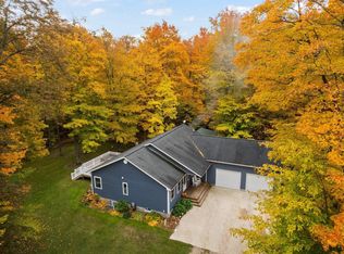 1585 Woodsborough Dr NW, Alden, MI 49612