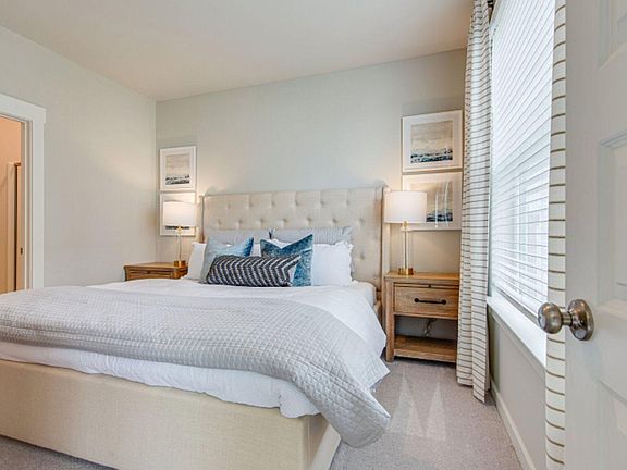 Master Bedroom, 1st floor, large windows looking to the golf course