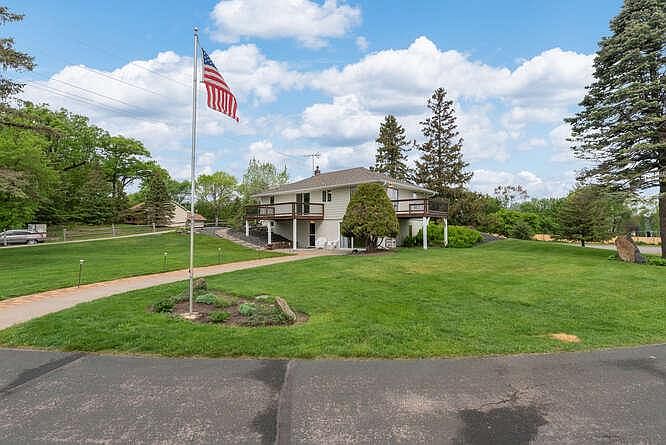 .76 acre lot and entrances to the basement or main level of the house