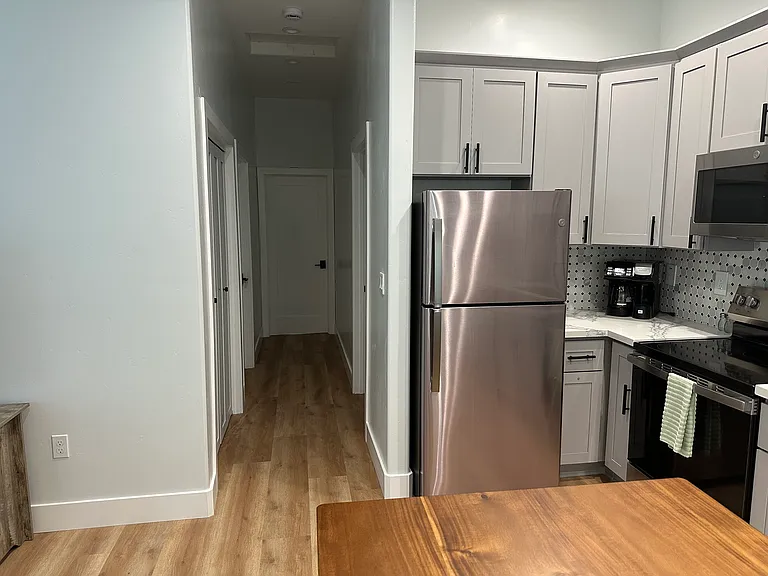 Comes fully equipped with refrigerator, dishwasher and garbage disposal.
