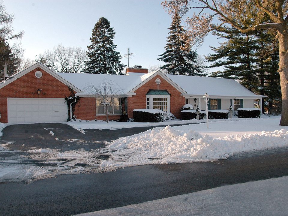 Elegant brick and cedar ranch