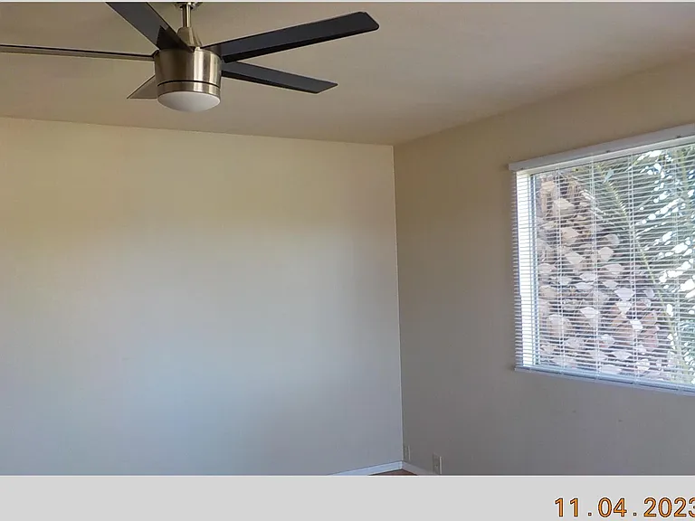 2490 W Yowell Ct — Photo 2