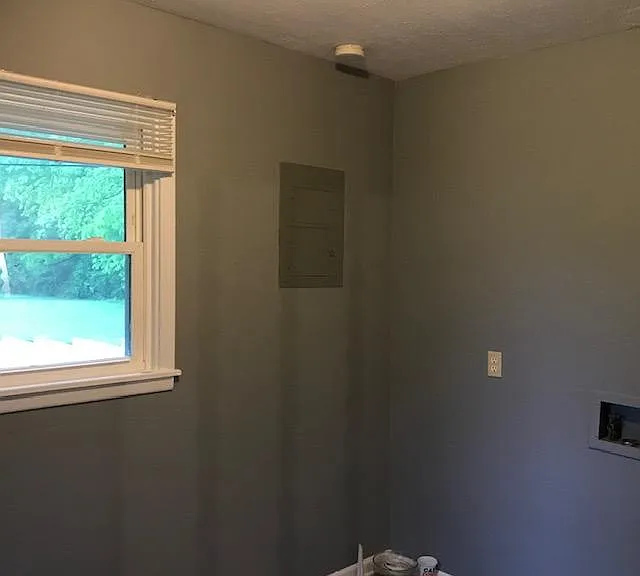 Utility room with window.