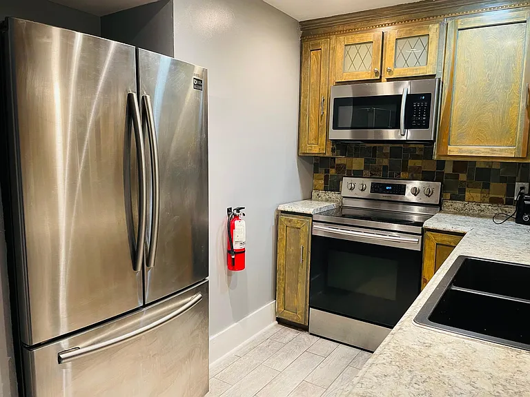 Kitchen with full size appliances.