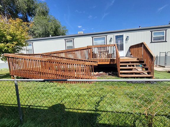 Chain link fence on south side is being replaced by 6' cedar privacy fence.