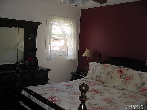The master bedroom is quaint and is perfect for those mornings when you want to sleep in.