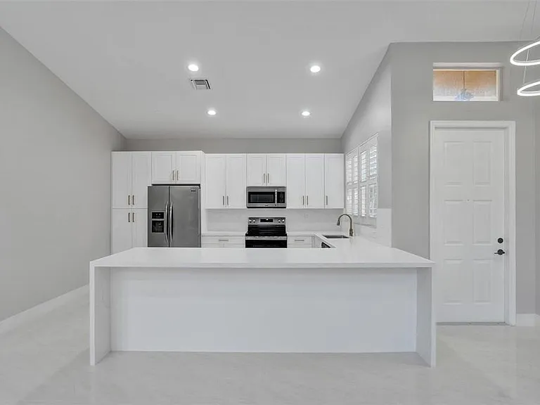 5885 NW 121st Ter — Photo 14