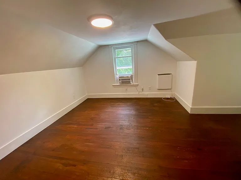 Attic room 1 with wall mounted convection zone heater