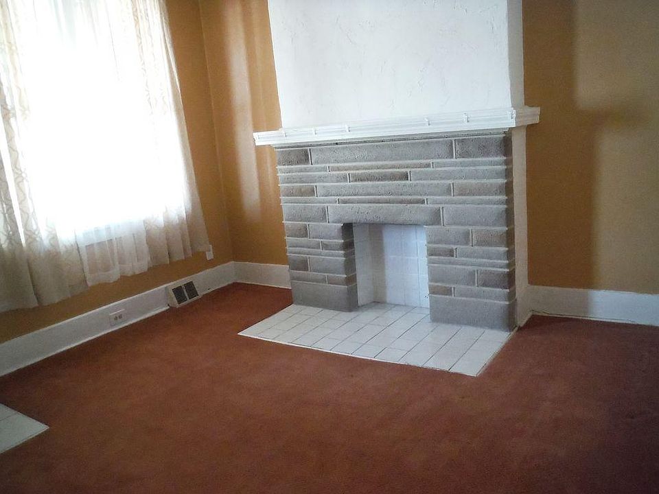 Living Room with Decorative Fireplace