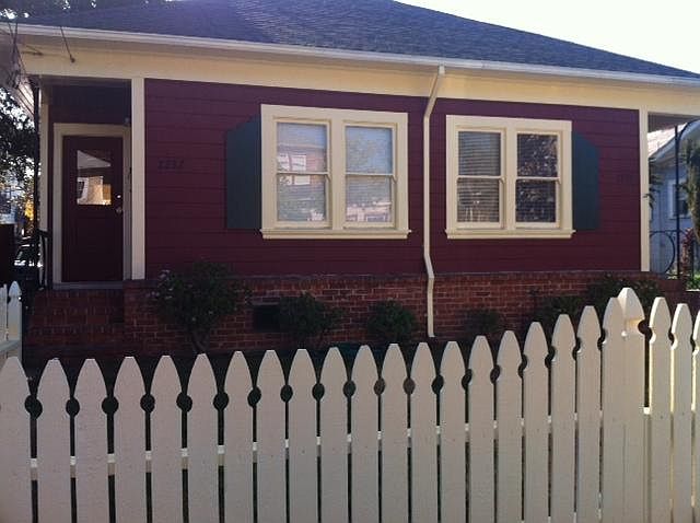 Front of Duplex -picket fence with plenty of off street parking
