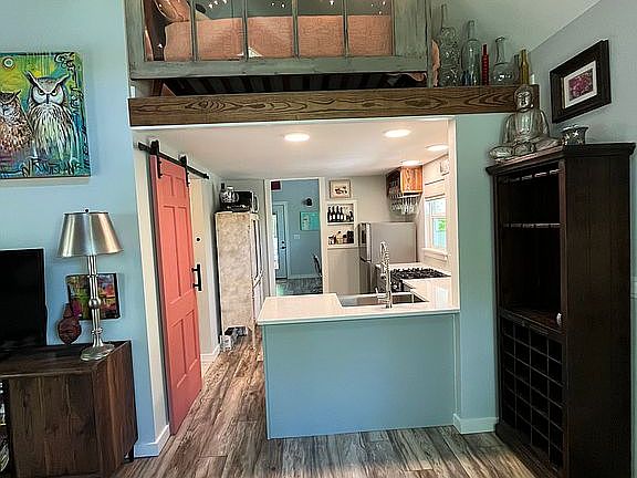 front room view kitchen/loft