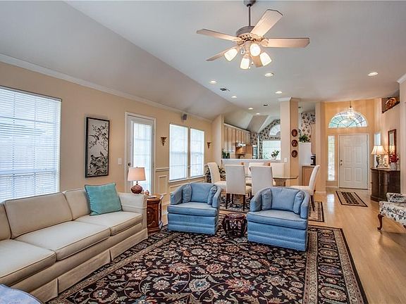 View of the Formal Dining Area and Open Break fast bar. Guests will be impressed with the open floor plan and the great flow for entertaining.