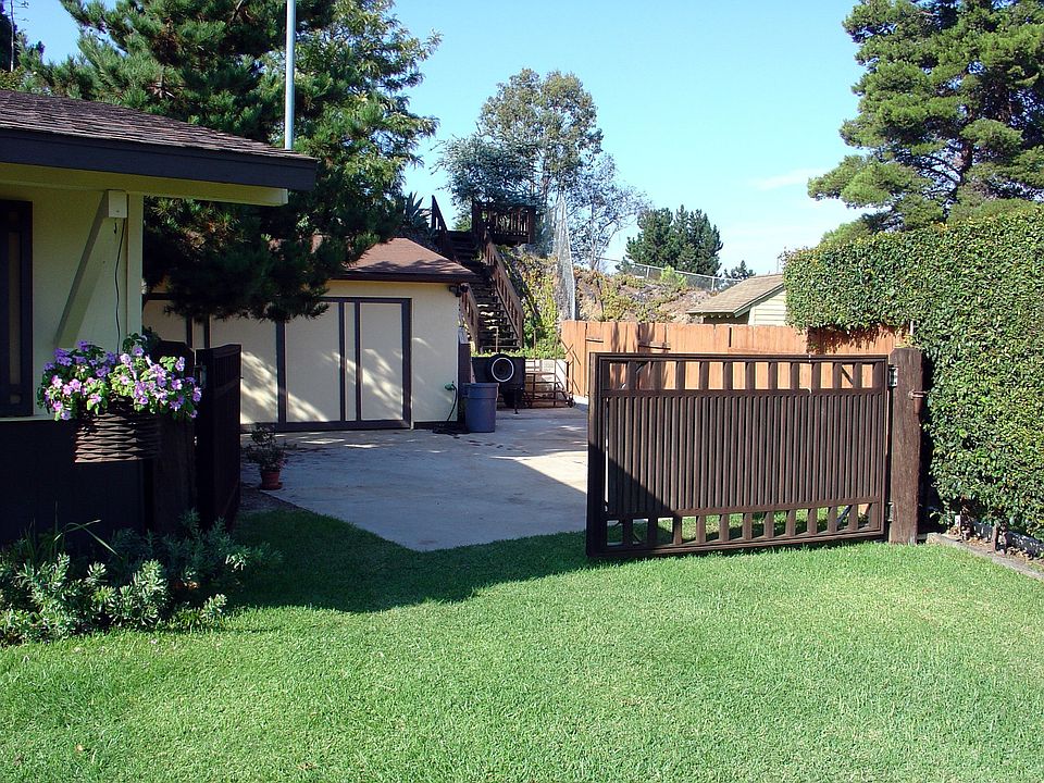 Side entry leading to extra garage