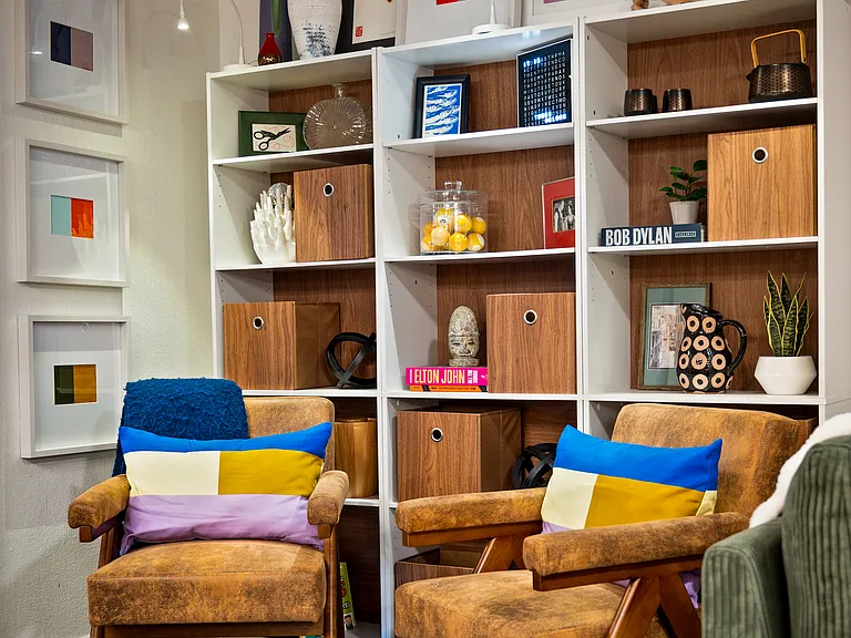 Cozy seating area to read and relax. Bookcases house games and books.