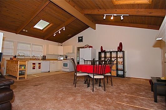 Gorgeous tongue and groove ceiling w/skylights is the focal point of this area