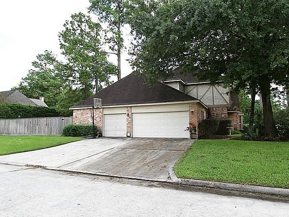 Side entry 3 car garage with huge workshop/ craft room.