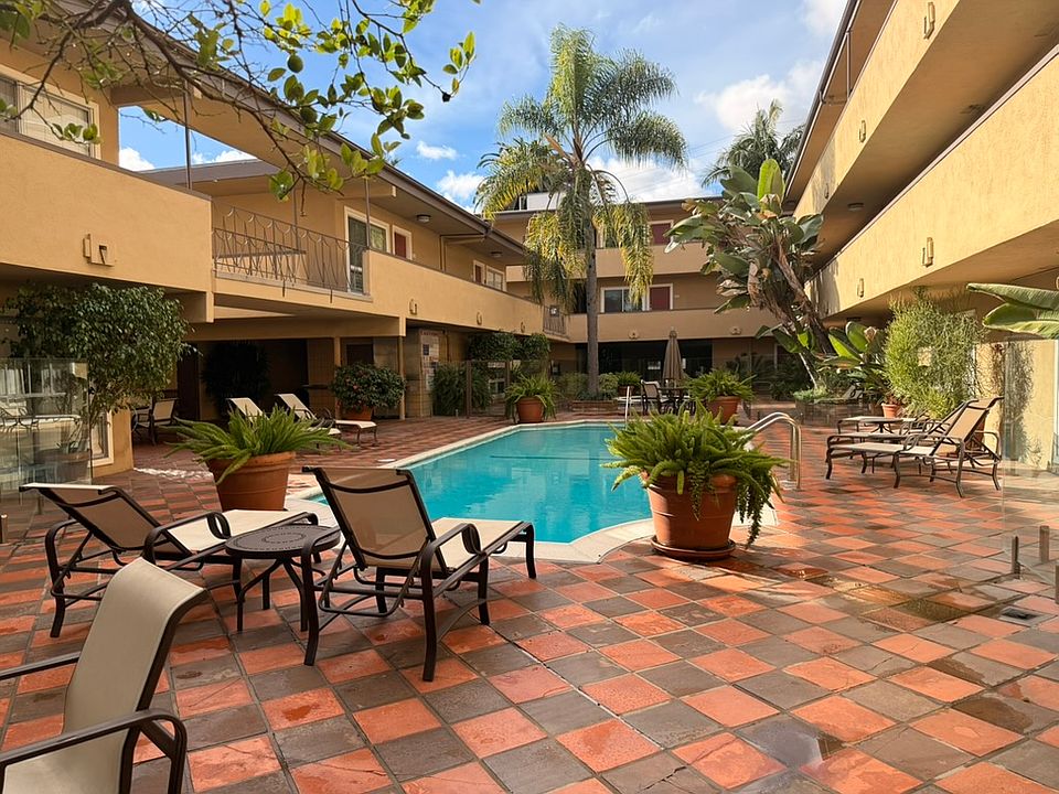 Resort-style heated pool and courtyard _ steps from your front door