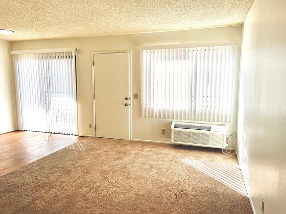 View of front door from living room