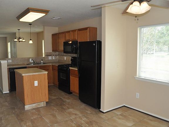 Tile back splash, stainless steel sink