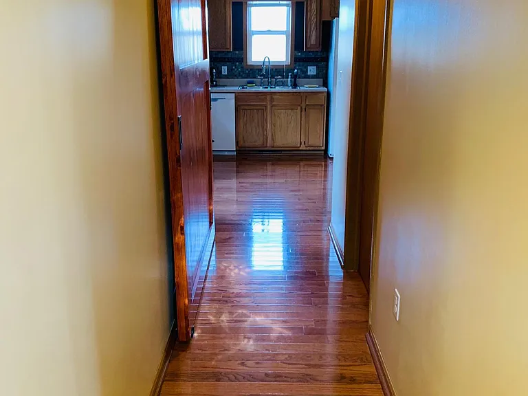 Hallway from kitchen to front door