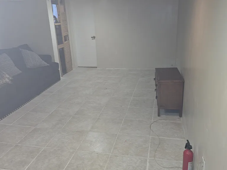 Finished basement, has half bathroom on the corner