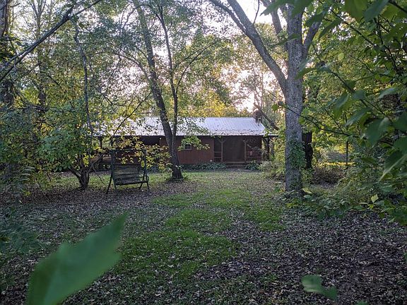 Shady front yard of main house