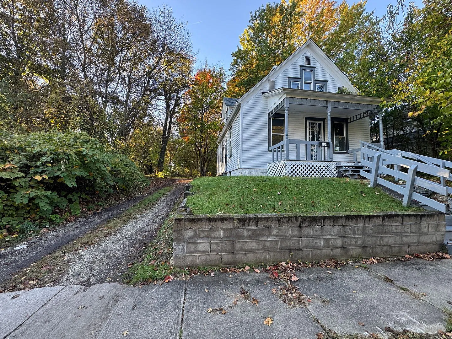 Charming 3-Bedroom Akron Home with Full Basement, Covered Porch & Flexible Living Space! — Photo 2