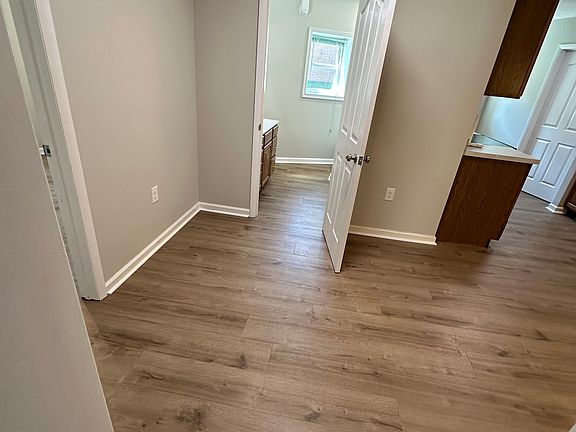 Entryway to the kitchen which has lots of extra room for storage.
