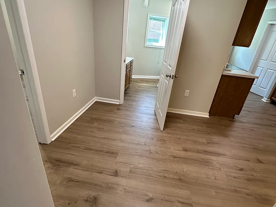 Entryway to the kitchen which has lots of extra room for storage.