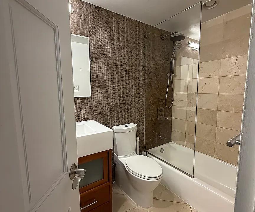 44 E 12th St #8A