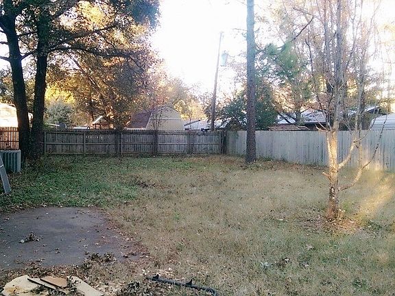 Large back yard with privacy fence